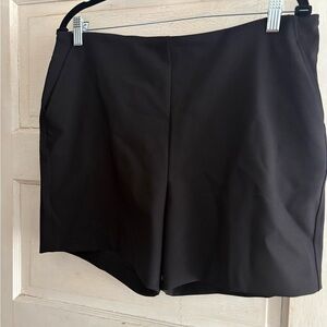 NWT Rachel Zoe black Women's Shorts. Size 12, pull on, slit pockets, 4 inch ins
